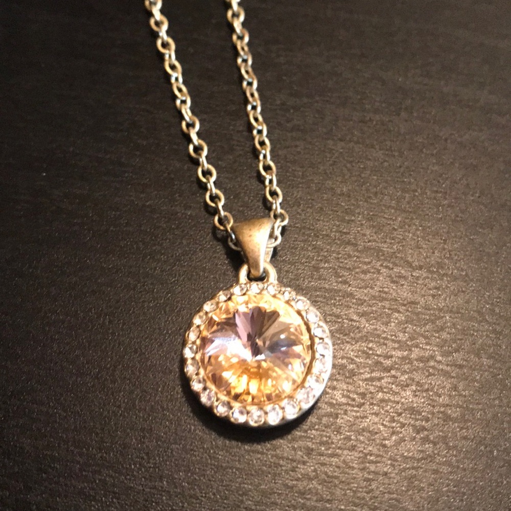 Yellow gem necklace.